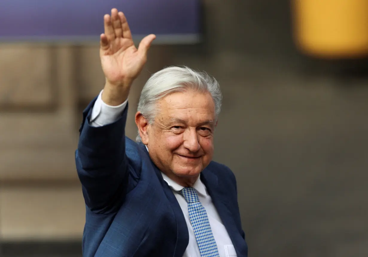 FILE PHOTO: Mexico's President Obrador hands over Mexican flag to athletes ahead of the Paris 2024 Olympic Games, in Mexico City