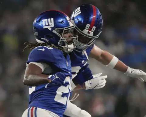 Gray runs for 2 touchdowns as the Giants beat the Lions 14-3 in a preseason game with few starters