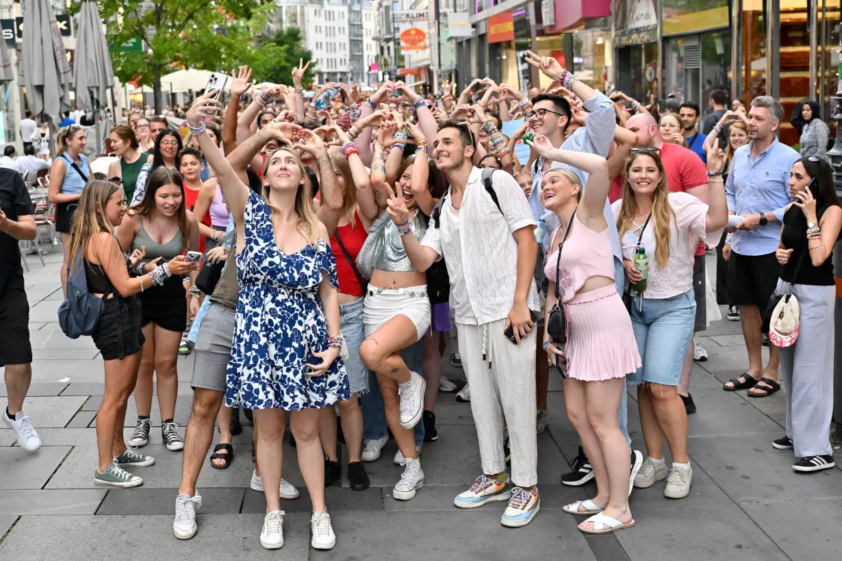 Fans of the singer Taylor Swift gather following the cancellation of three Taylor Swift concerts at Ernst Happel Stadium in Vienna