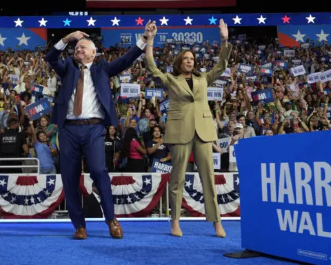 The Latest: Harris and Walz hold rally in Arizona, while Trump visits Montana