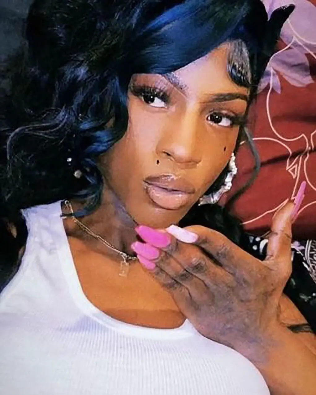 A transgender woman was found killed in a West Baltimore alley, prompting demands for answers and justice