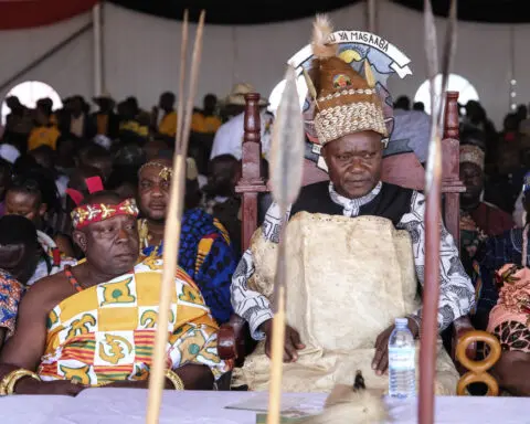 A mass circumcision is marketed to tourists in a remote area of Uganda. Some are angrily objecting