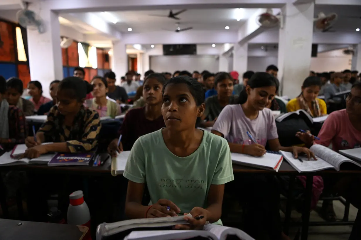 India's youth flock to cram schools in search of security of government jobs