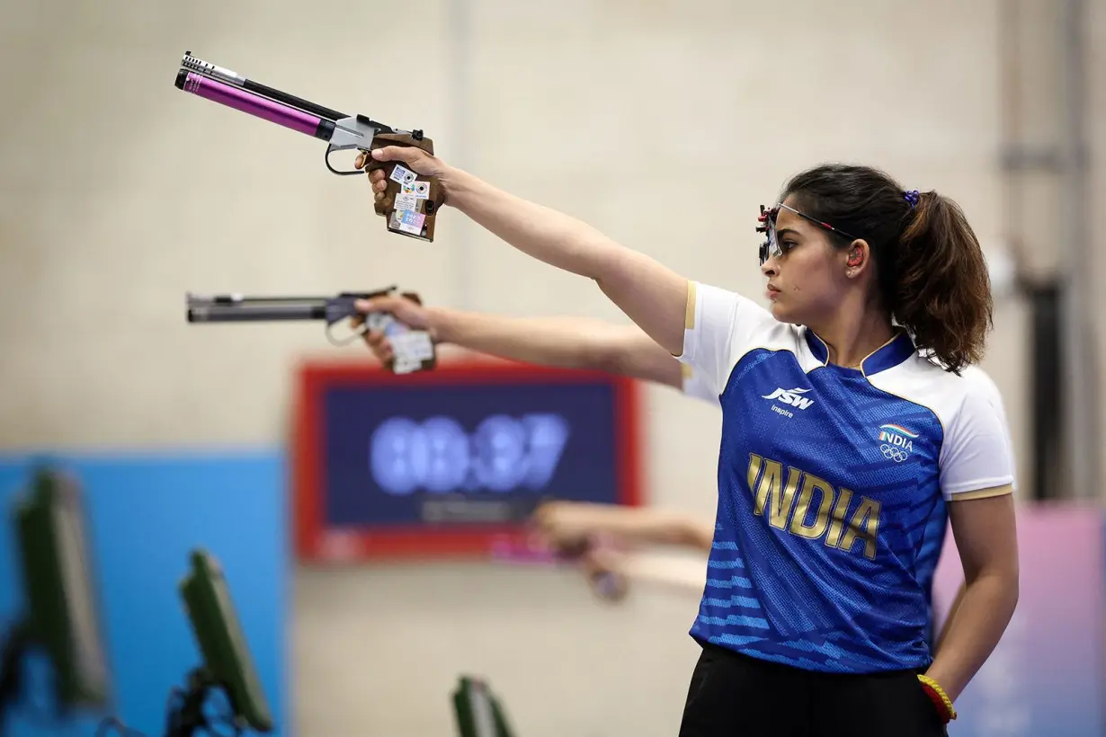 India's Manu Bhaker competes in 10m air pistol mixed team bronze medal match during the Paris 2024 Olympic Games at Chateauroux Shooting Centre on July 30.