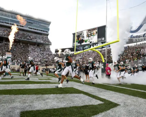 Michigan State sued by quiz creator over Hitler question streamed on videoboards at football game