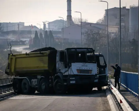 Kosovo's premier calls for full reopening of key bridge in flashpoint city. But the West is wary