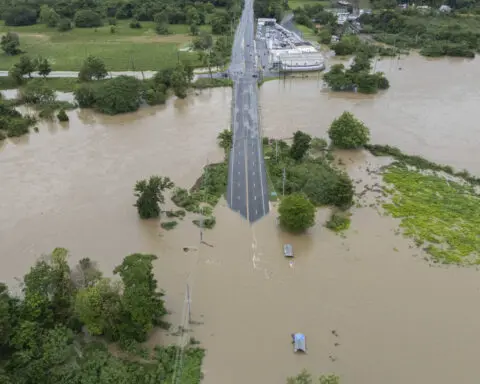 Hurricane Ernesto drops torrential rain on Puerto Rico as it strengthens heading toward Bermuda