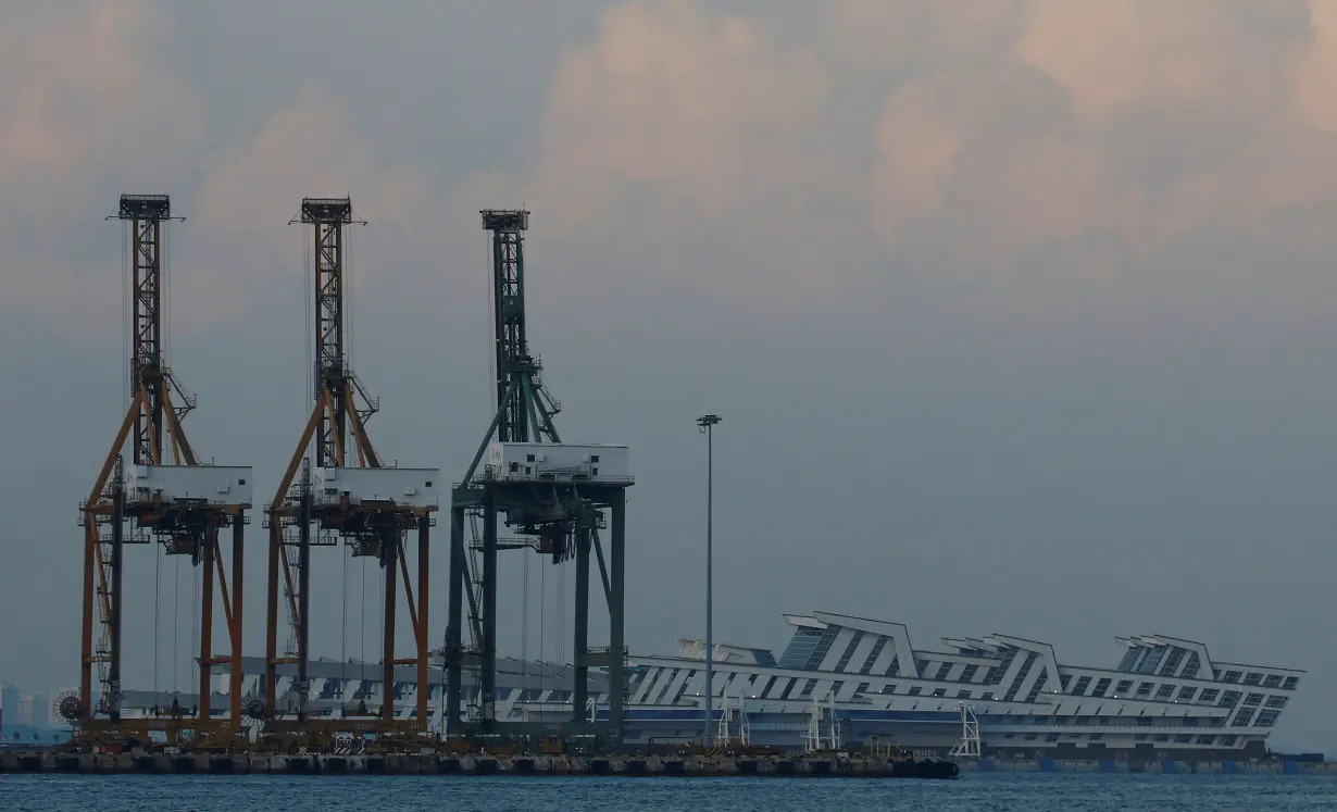 Container cranes are pictured at the Port of Singapore