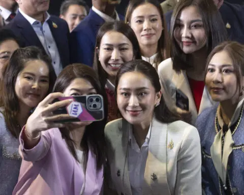 Thailand's new prime minister renews the legacy of her divisive father, Thaksin Shinawatra