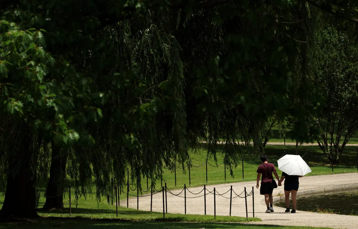 A couple walk on the National Mall in Washington