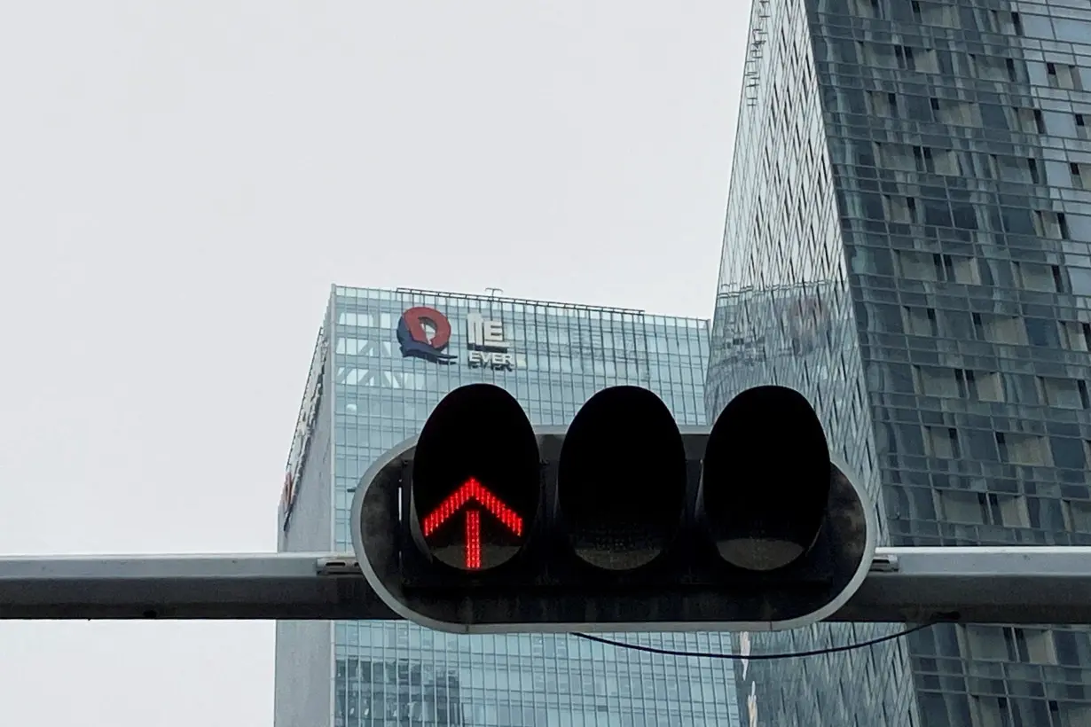 FILE PHOTO: Partially removed company logo of China Evergrande Group in Shenzhen