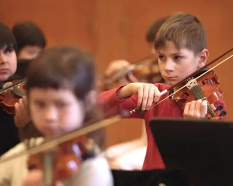 His love of music is helping refugees and immigrants build new lives