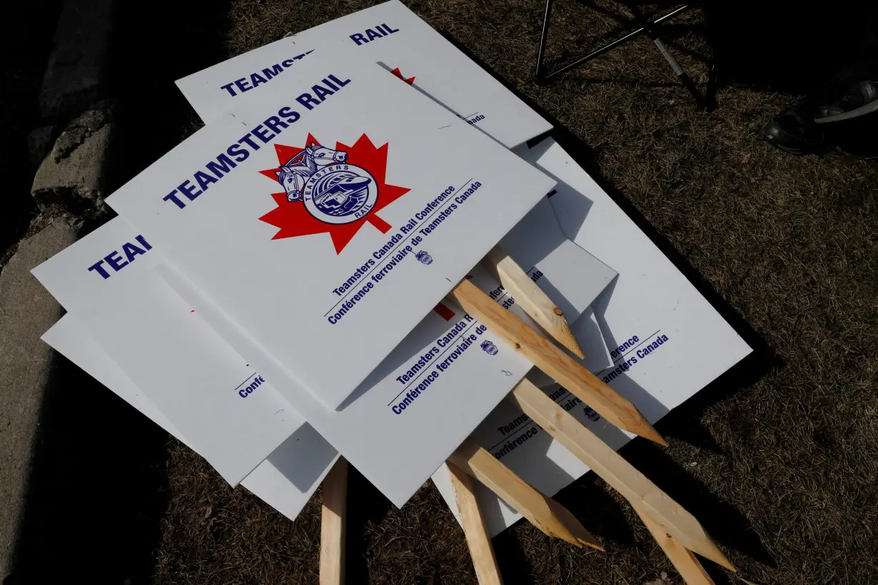 FILE PHOTO: Teamsters union workers picket signs outside CP Rail's Toronto Yard