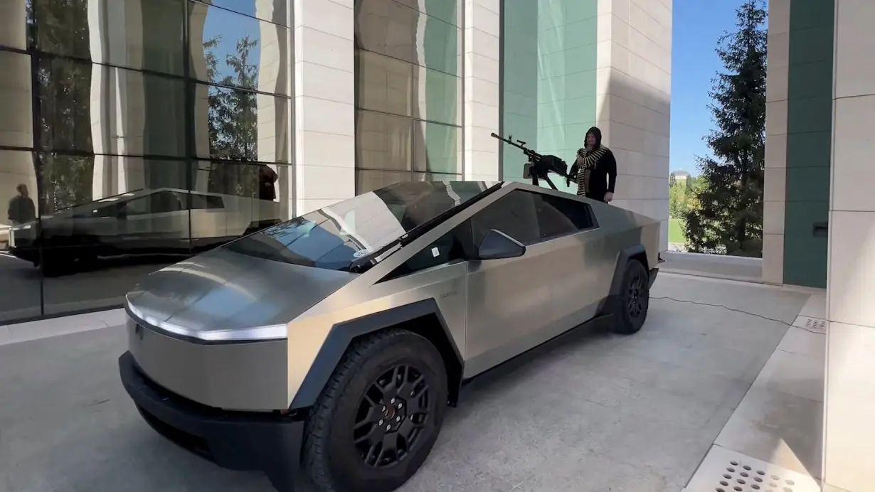 Leader of Russia's Chechnya region Ramzan Kadyrov is seen atop Tesla truck equipped with in Grozny