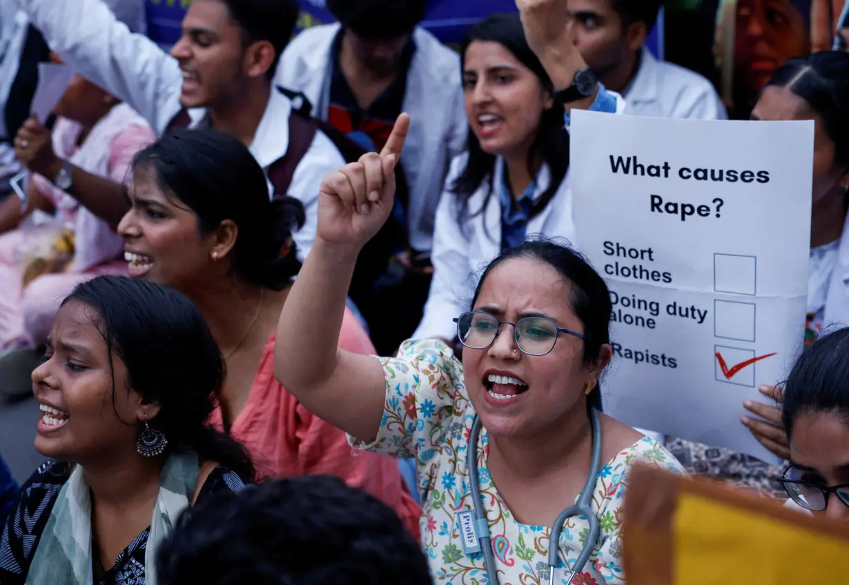 Protest march demanding justice following the rape and murder of a trainee medic at a hospital in Kolkata, in New Delhi