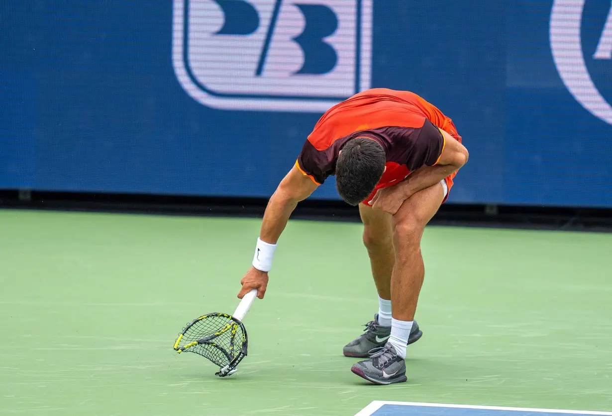 Carlos Alcaraz apologizes for smashing and breaking racket in 'worst match' of his career