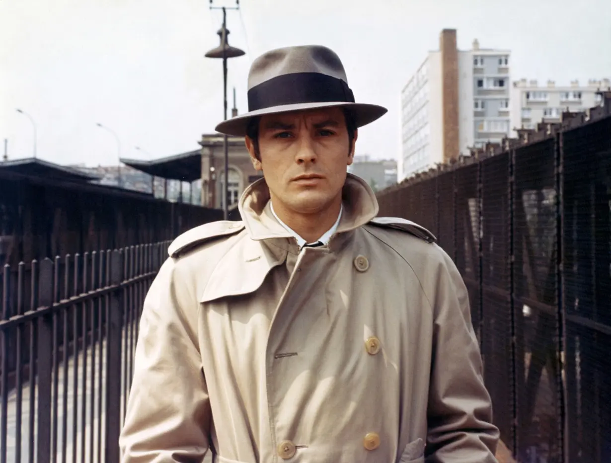 French actor Alain Delon on the set of Le Samourai, written and directed by Jean-Pierre Melville.