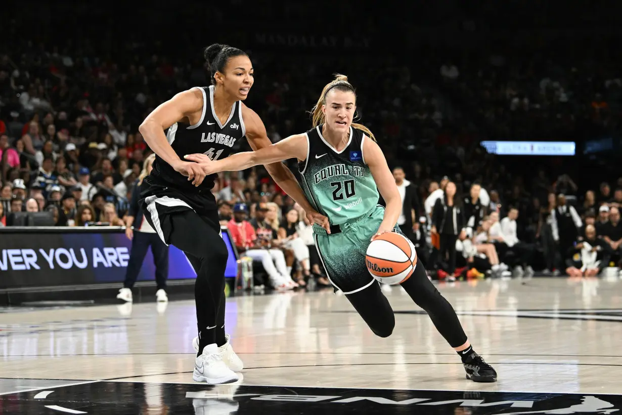 New York Liberty become first WNBA team to clinch playoff berth with win against defending champion Las Vegas Aces