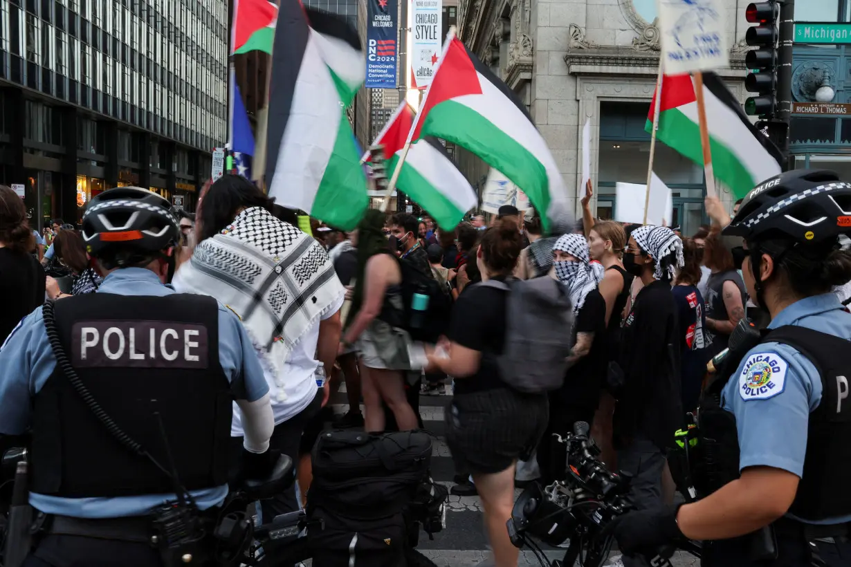 People take part in a protest organized by pro-abortion rights, pro-LGBT rights and pro-Palestinian activists, in Chicago