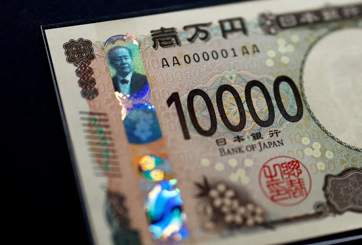 FILE PHOTO: Japan began circulating its first new banknotes in 20 years in Tokyo