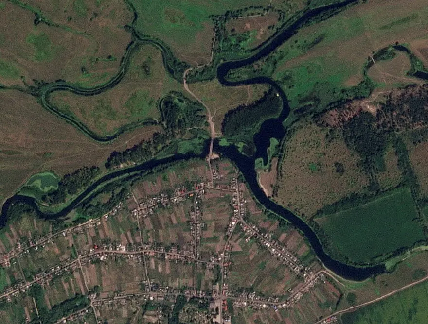 A satellite image shows a strategic bridge over the Seym River that has been destroyed, in Zvannoe