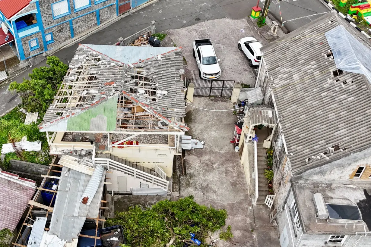 Buildings with damaged roofs are seen in a drone photograph after Hurricane Beryl passed Grenada