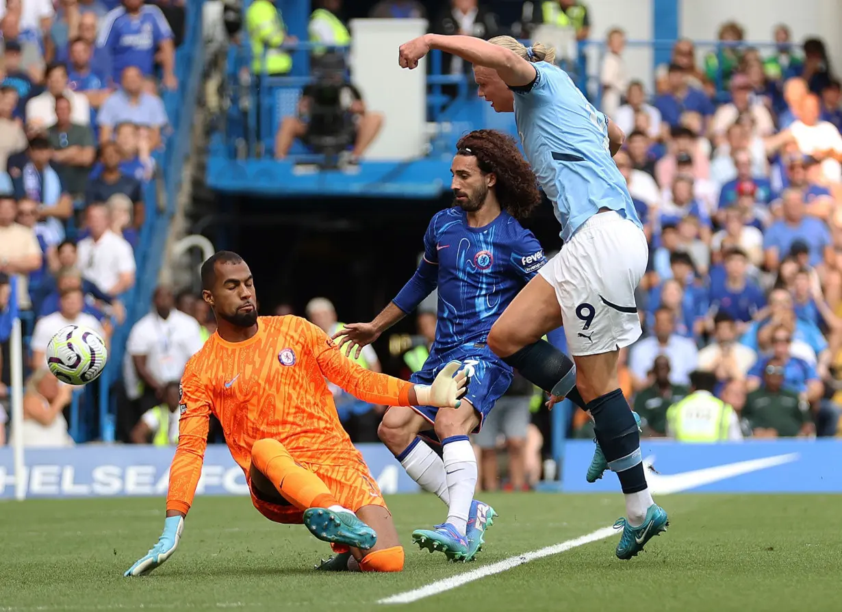 Erling Haaland scores as Manchester City begins Premier League title defense with a win