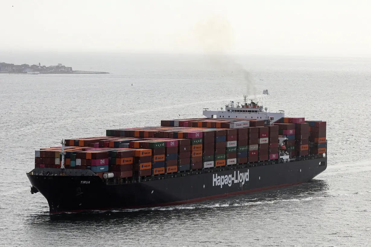 The container ship Tirua Hapag-Lloyd enters New York Harbor in New York