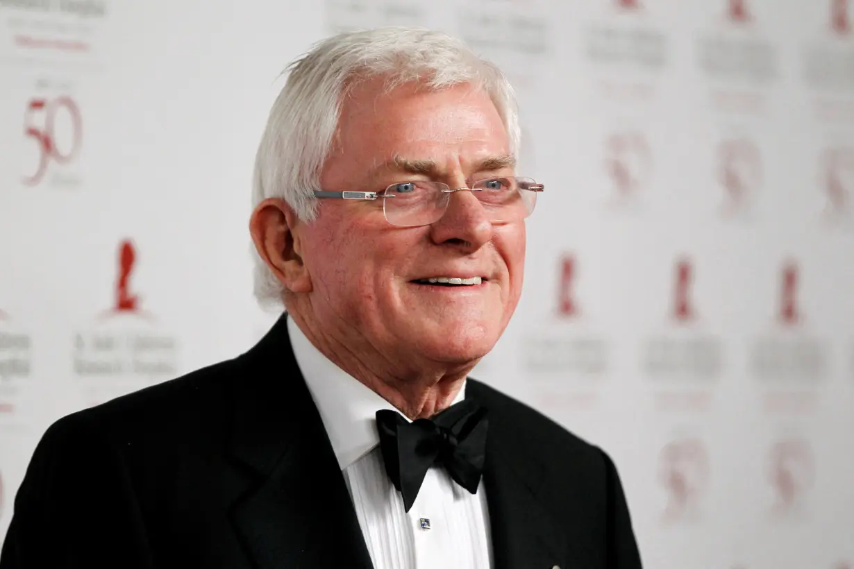 FILE PHOTO: Phil Donahue poses at the benefit gala for the 50th anniversary of St. Jude Children's Research Hospital in Beverly Hills