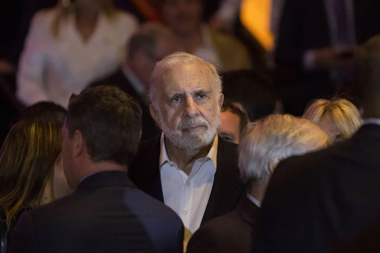 Investor Carl Icahn charged with hiding billions in loans