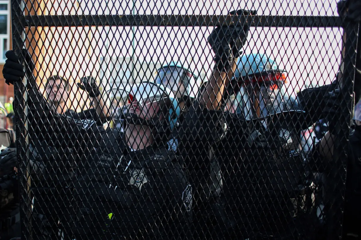 Four arrested after fence breach at DNC, Chicago police says