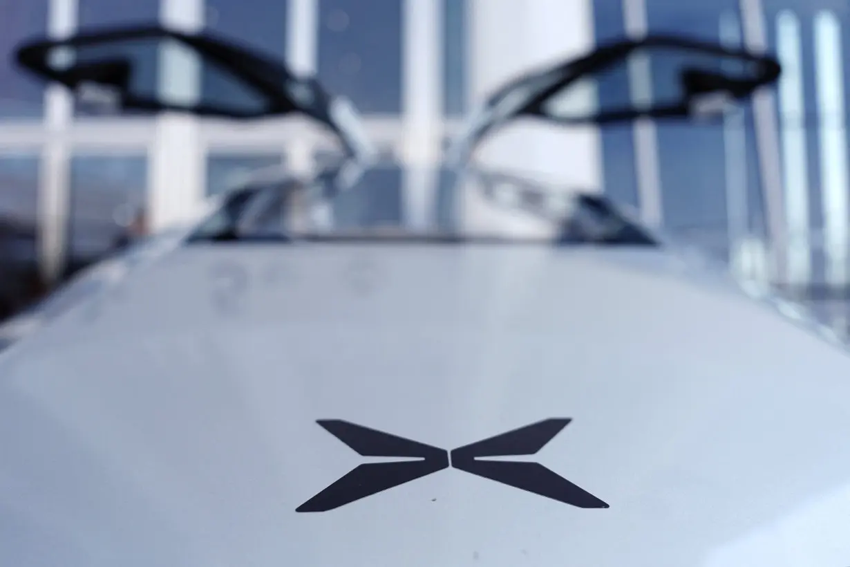 A logo of XPeng is seen on the electric flying car XPeng Voyager X2 by XPeng AeroHT, before a demonstration flight in Beijing