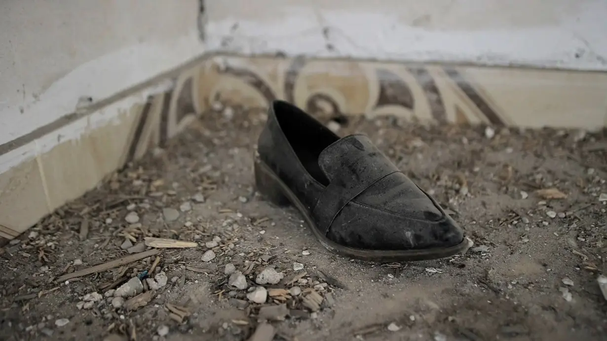 A shoe on the floor of the house in northern Gaza where Sham and Sanaa sheltered over a terrifying night in November.