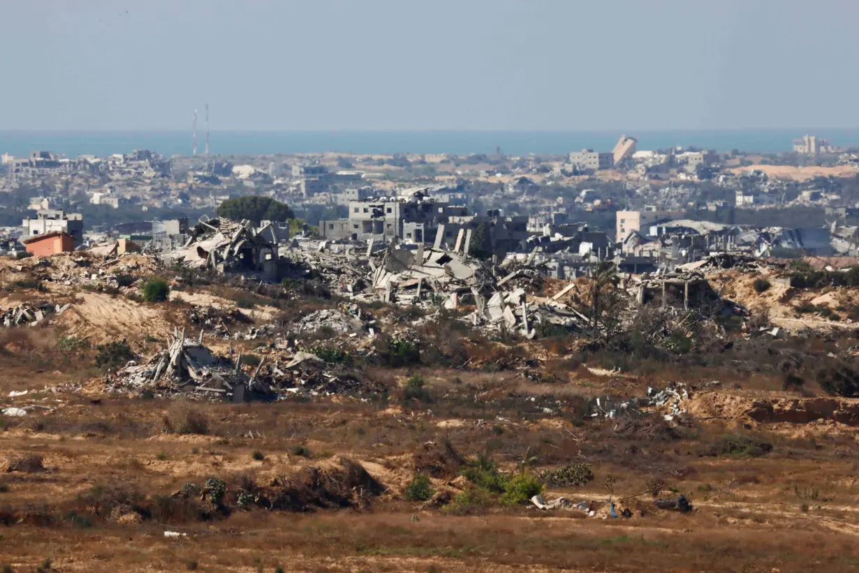 A view of destroyed buildings in Gaza, as seen from southern Israel