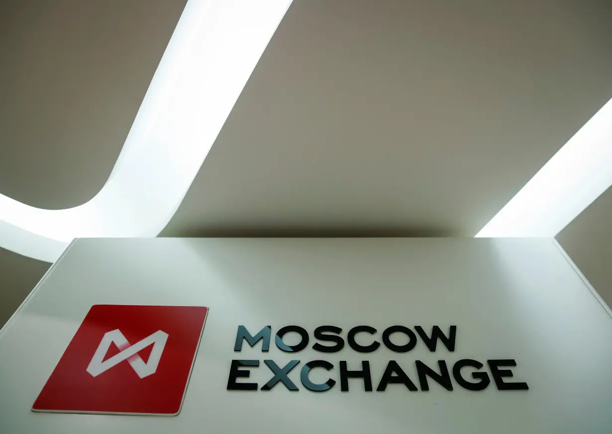 FILE PHOTO: The logo of the Moscow Exchange is seen inside its office in Moscow