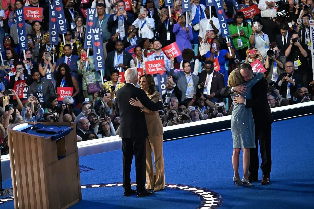 Presdient Joe Biden and Vice President Kamala Harris on stage at the end of the first night of the 2024 Democratic National Convention in Chicago on August 19.