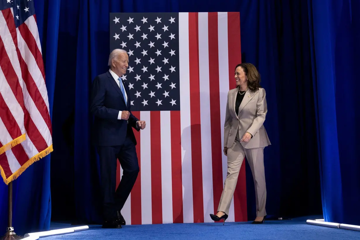 President Joe Biden and Vice President and Democratic presidential candidate Kamala Harris (again in light brown) at Prince George's Community College in Maryland on August 15, 2024.