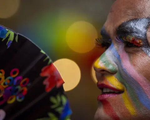 Same-sex couples and LGBTQ+ activists rally in Nepal's capital during the annual Pride parade