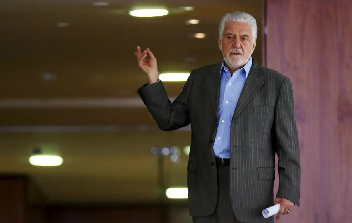 Brazil's Presidential Chief of Staff Wagner gestures before the meeting 