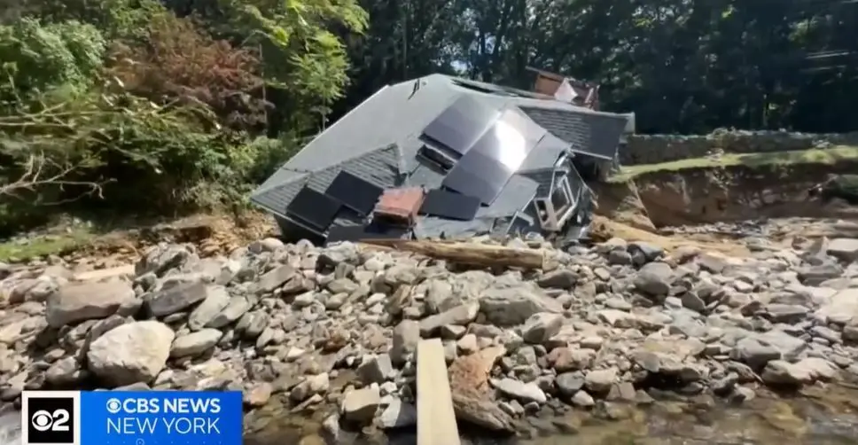 Shocking video shows Connecticut house collapse into floodwaters during Sunday's historic storm