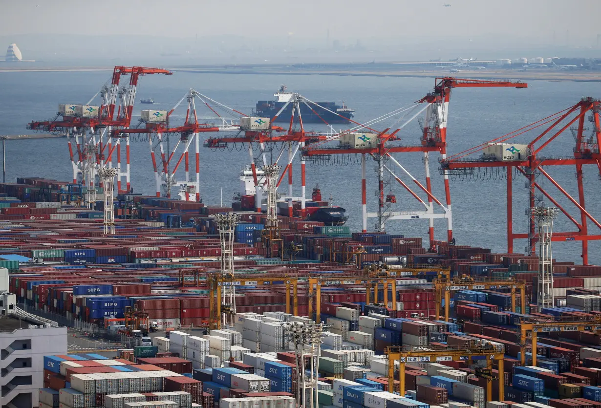 Shipping containers are seen at a port in Tokyo, Japan