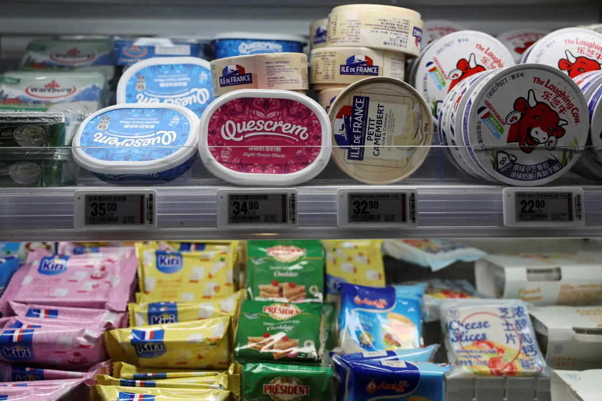 FILE PHOTO: Cheese products are seen displayed at the dairy section of a supermarket in Beijing