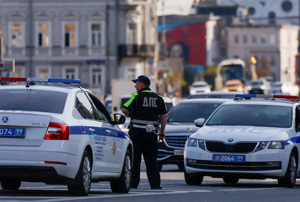 A traffic police officer works in a street in central Moscow