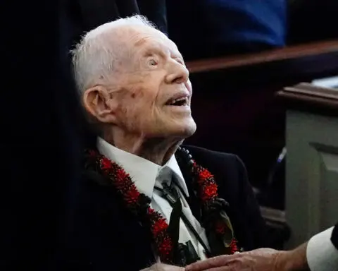 Former US president Carter, nearing 100, excited to vote for Harris, grandson says