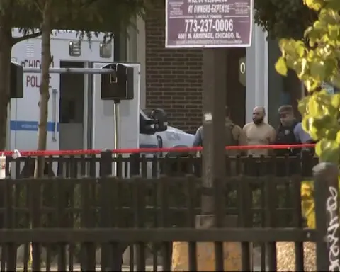 Man wanted on murder charges is apprehended at Chicago restaurant just blocks from DNC