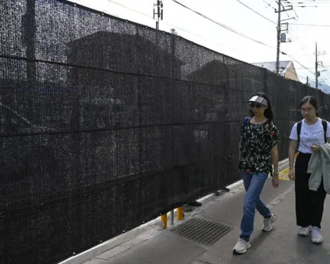Japanese town quietly removes its Mount Fuji-blocking barrier