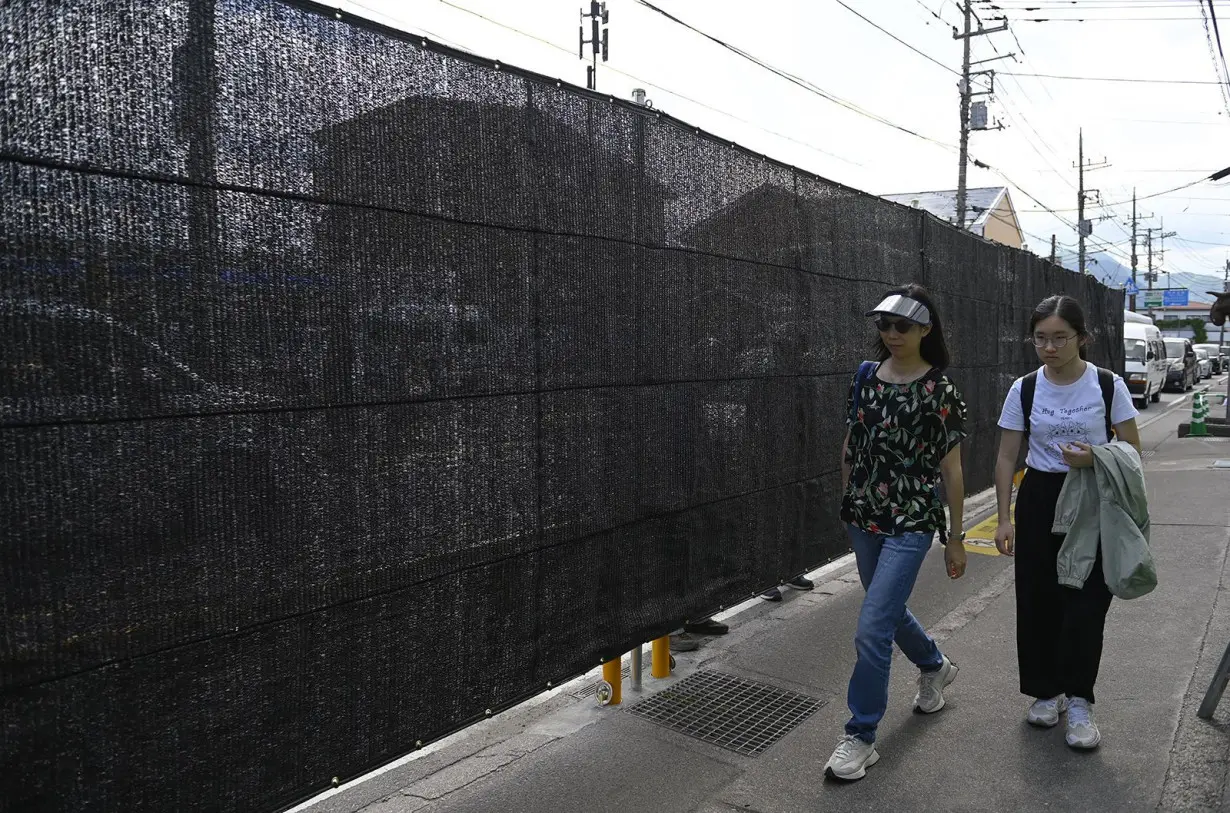 Japanese town quietly removes its Mount Fuji-blocking barrier