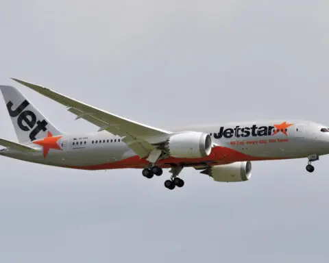 Man opens plane's door and walks on wing at Australian airport before he's arrested