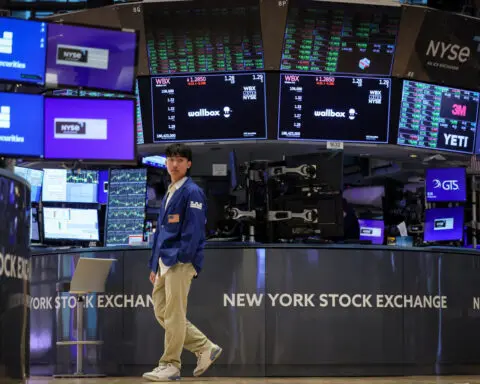 Wall St ends lower as tech shares weigh; Jackson Hole in focus