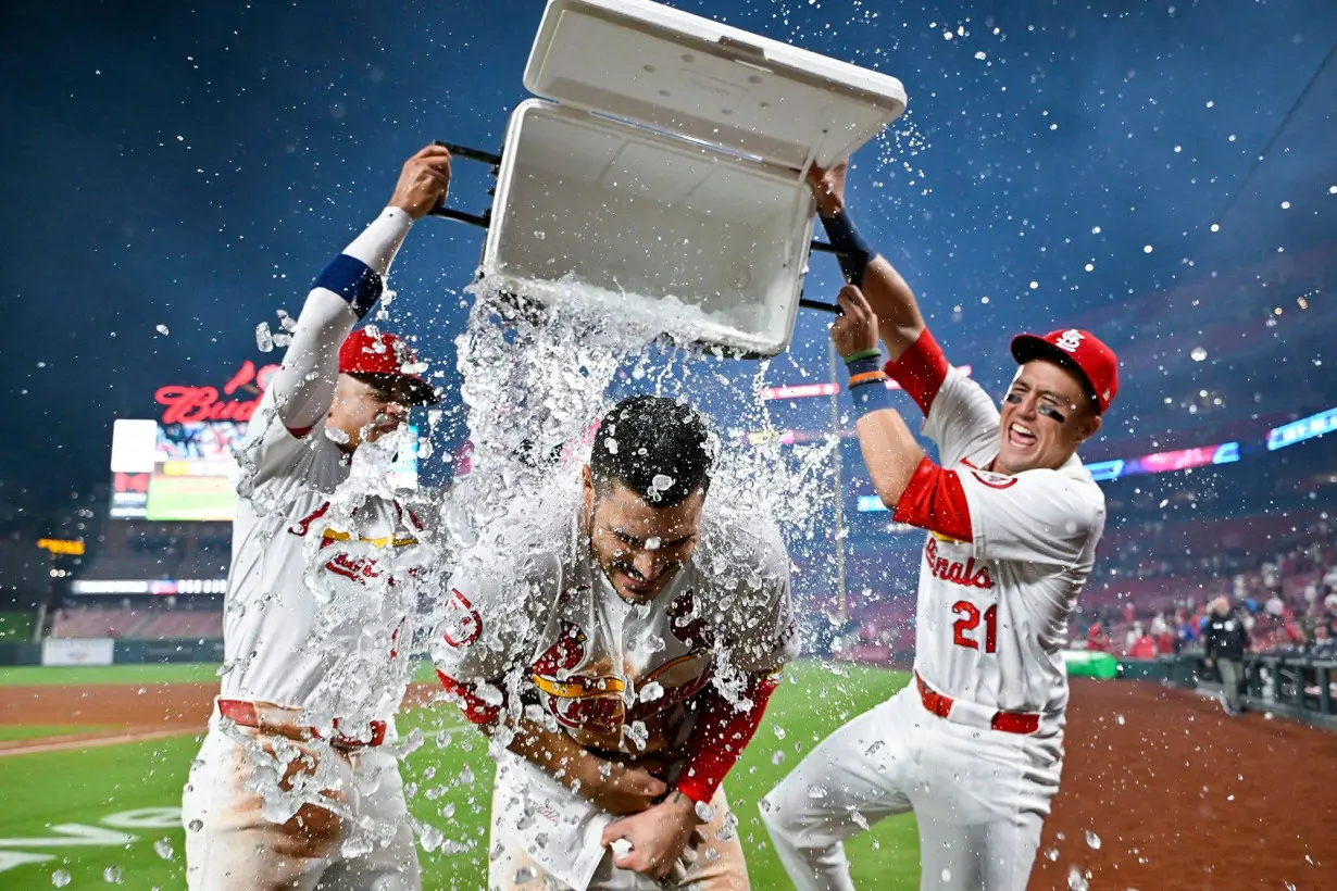 Arenado is doused after hitting a walk-off grand slam against the Milwaukee Brewers.